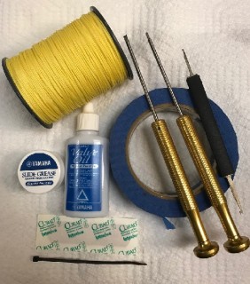 items to stock in a winds repair kit -- screwdrivers, spring hook, blue painter's tape, cable tie, non-latex bandage, lubricant.