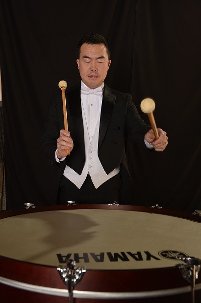 Eric Shin playing drums