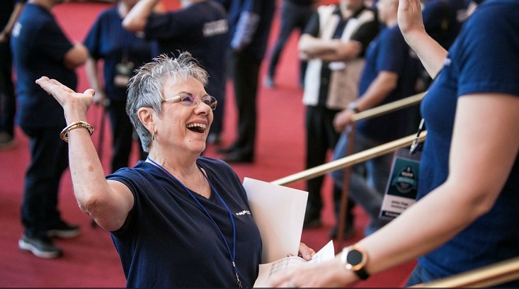 Marcia Neel high-fiving someone at the 2018 NAMM Fly-in