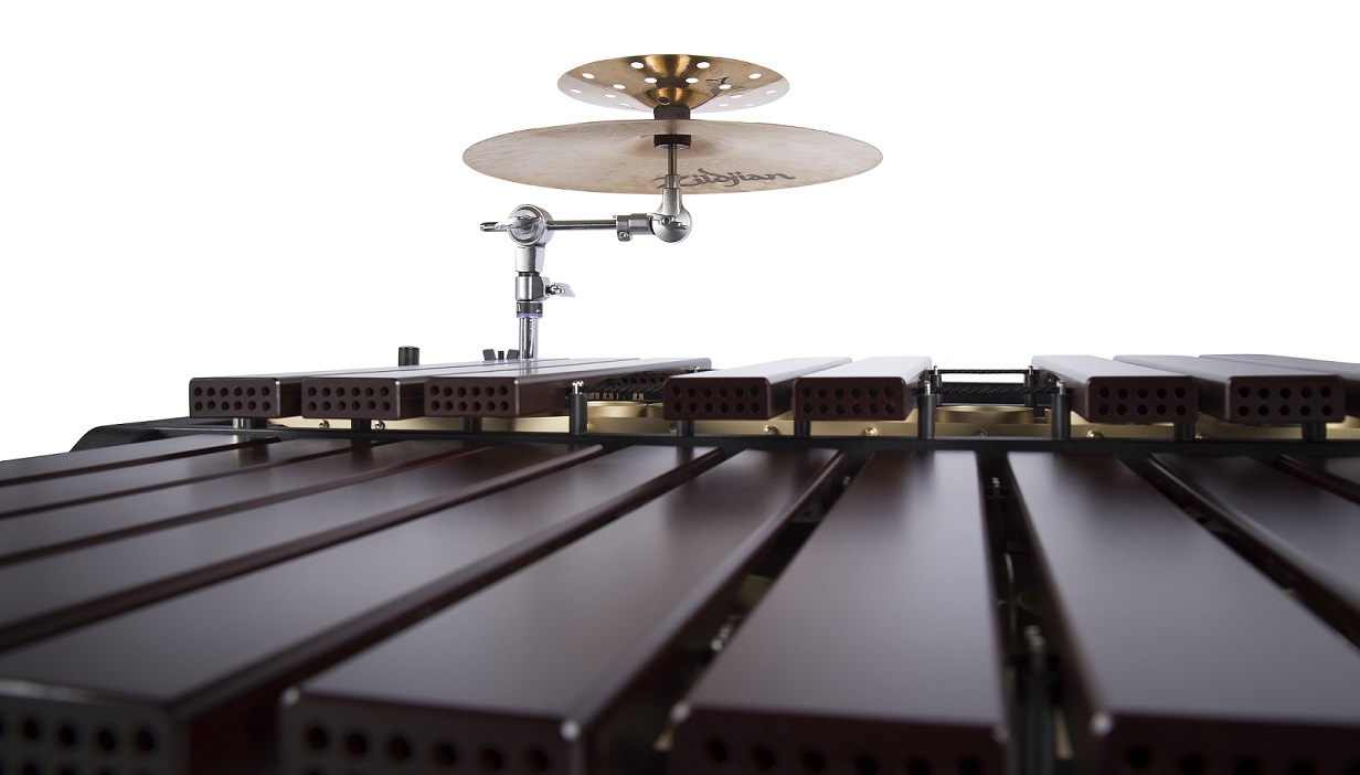 close up of marimba with attached cymbals