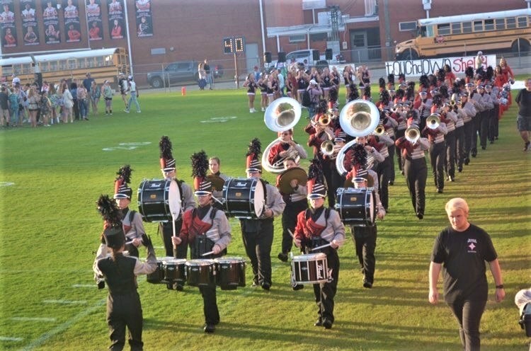 Shelby County High School band entering football field for performance 