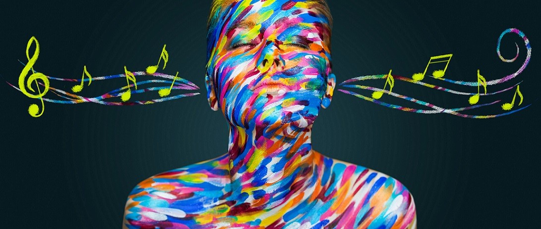 artwork of female's face, neck and shoulders painted in bright colors with musical notes coming out of her ears 