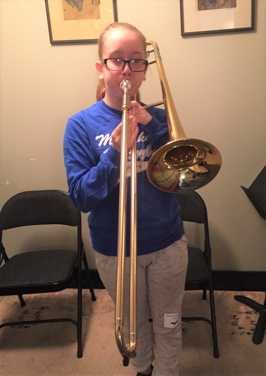 Madi Smith practices the trombone. 