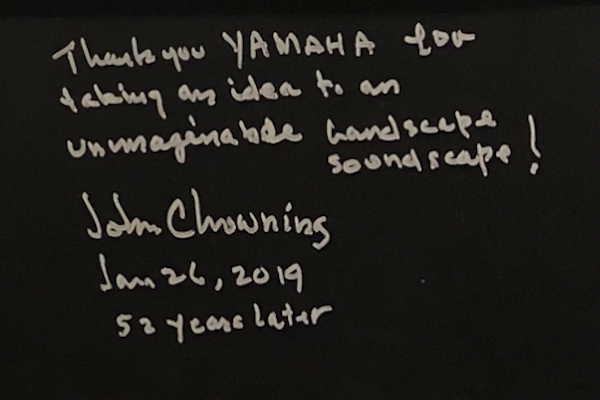 Handwritten note by John Chowining on Yamaha MODX.