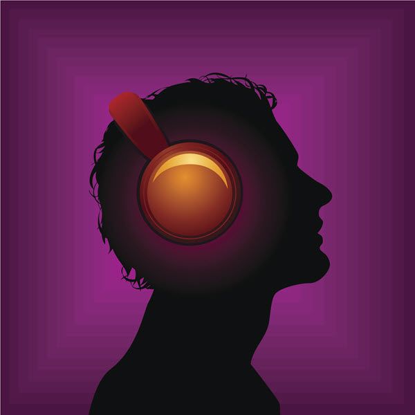 Profile of a person wearing a headset.