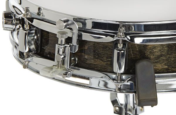 Closeup of edge and connection for snare drum to stand.