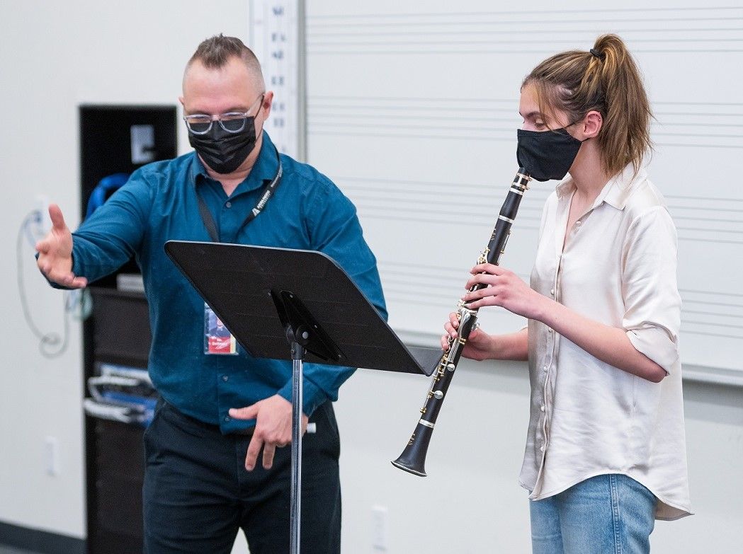 Aaron Zeilinger with clarinet student at Orange Lutheran High School