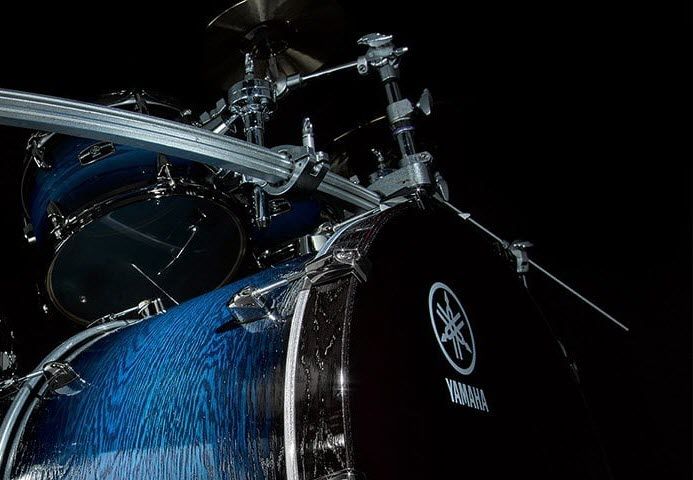 Closeup of drum set with Yamaha logo visible.