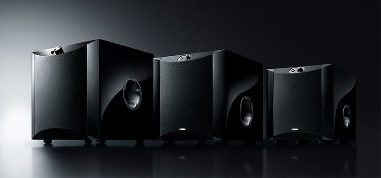 An image of three subwoofers lined up.