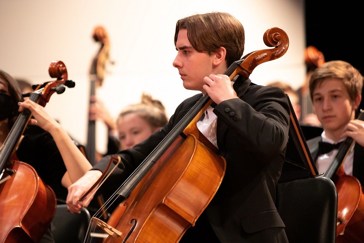 male cello player wearing tux