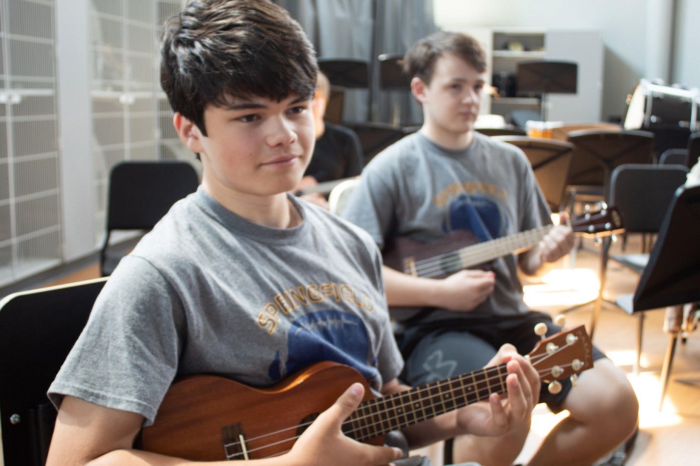 Springfield High School students playing the ukulele