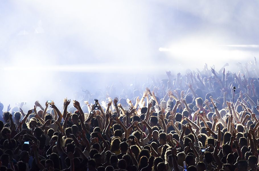 View of a crowd at a stadium concert.