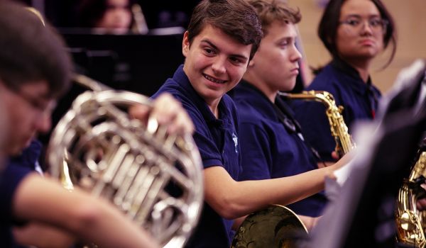 brass section during rehearsal