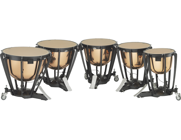 Set of five timpani in a curved row.