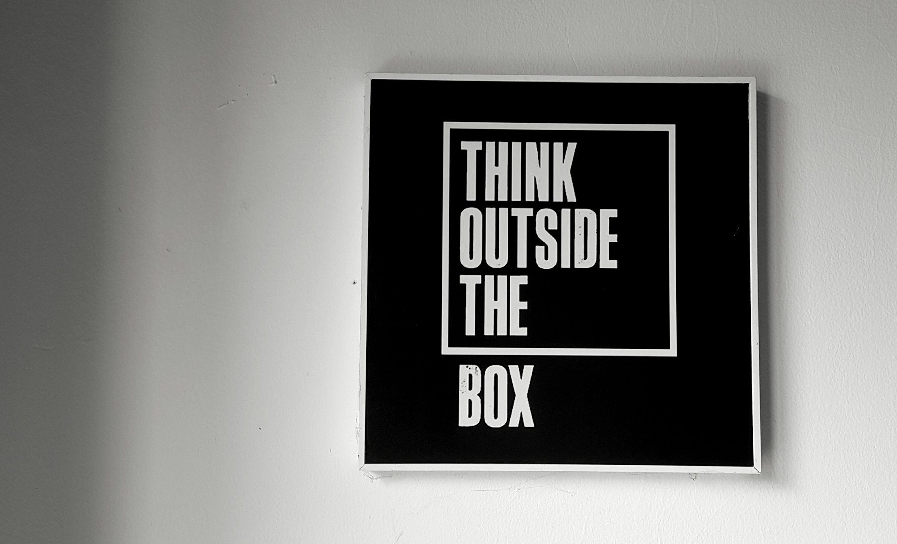 sign that says "Think Outside the Box"