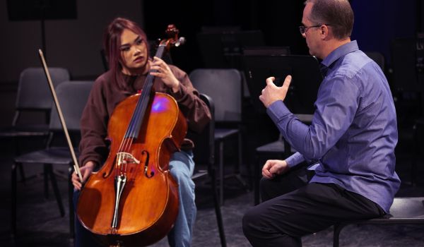 cello student with teacher