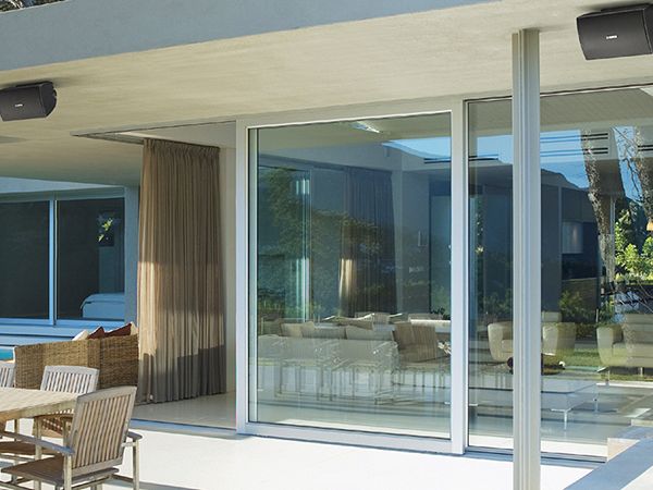 Patio with awning and hanging speakers.