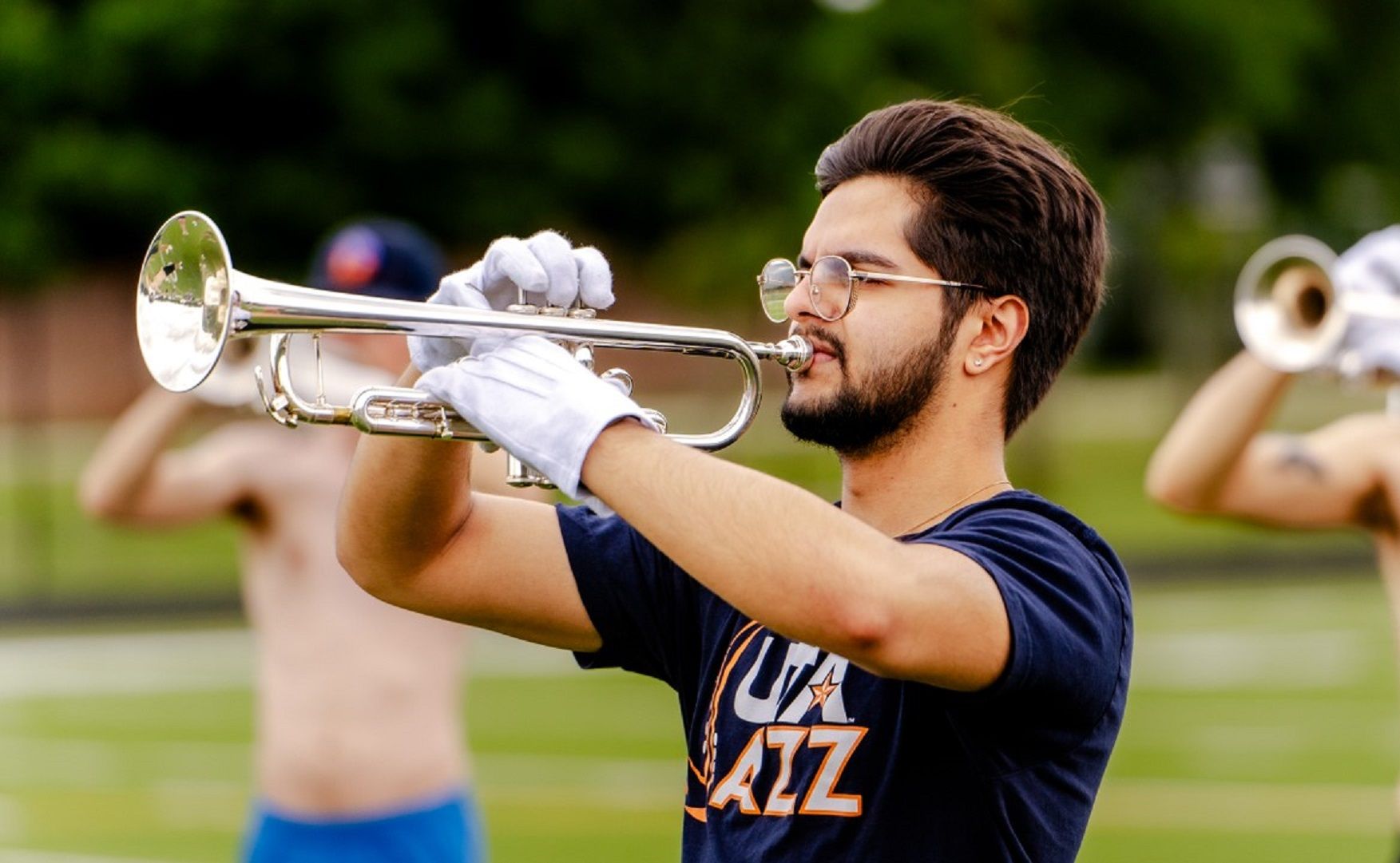 student playing the trumpet