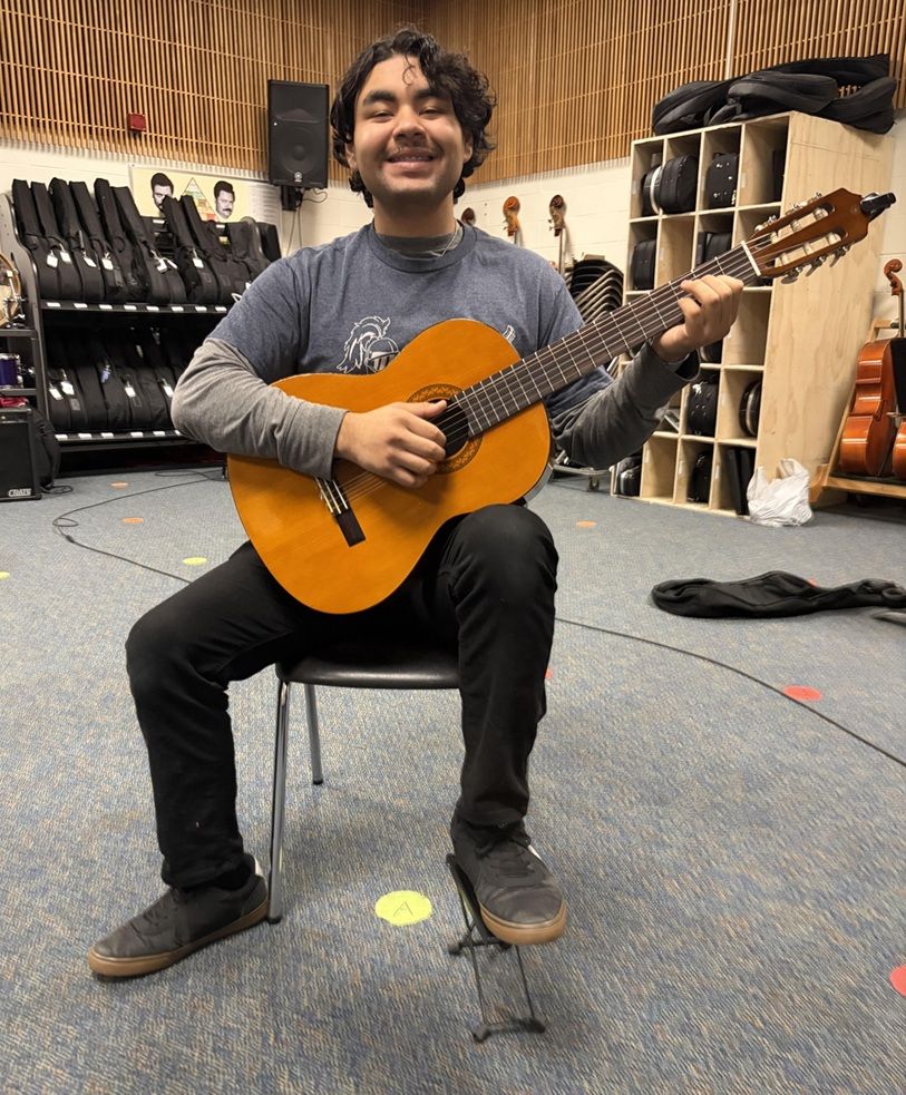 guitar student sitting