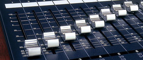 Mixing board slides arranged in a ascending line.