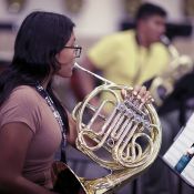 female French horn player