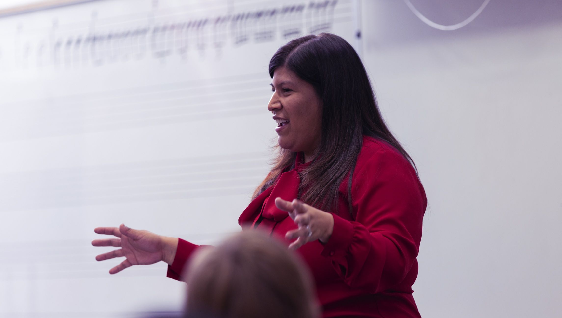 music educator in front of class