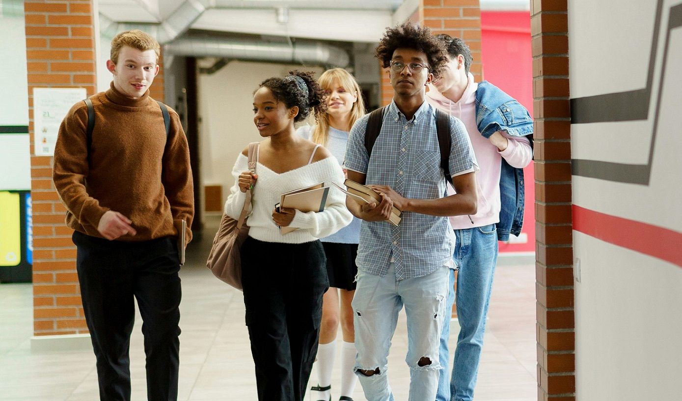 students walking down school hall