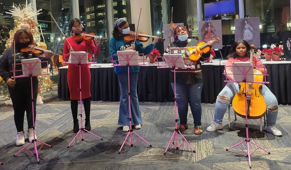 five female students perform at the Nutcracker pre-show