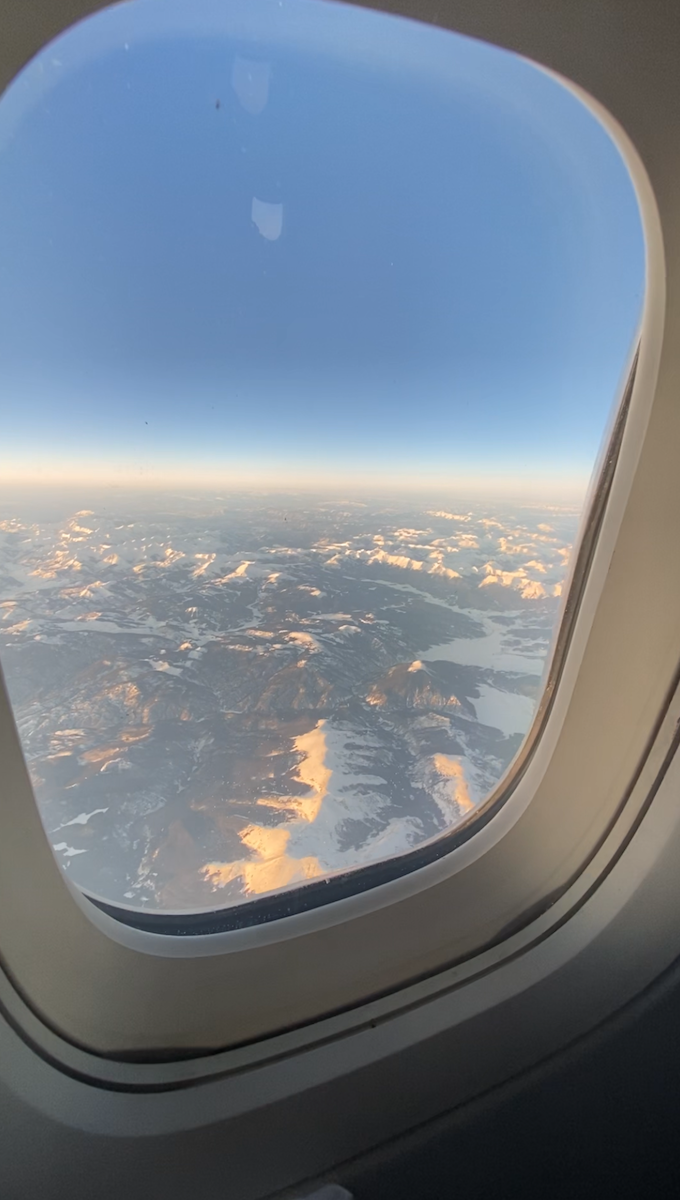 View of the Grand Canyon from the window of an airplane.