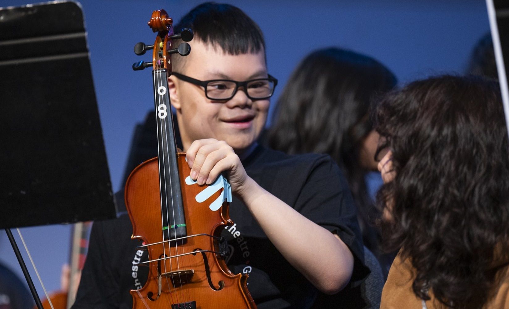 Crescendo Orchestra violin player