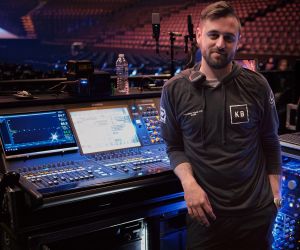 man in front of audio mixer