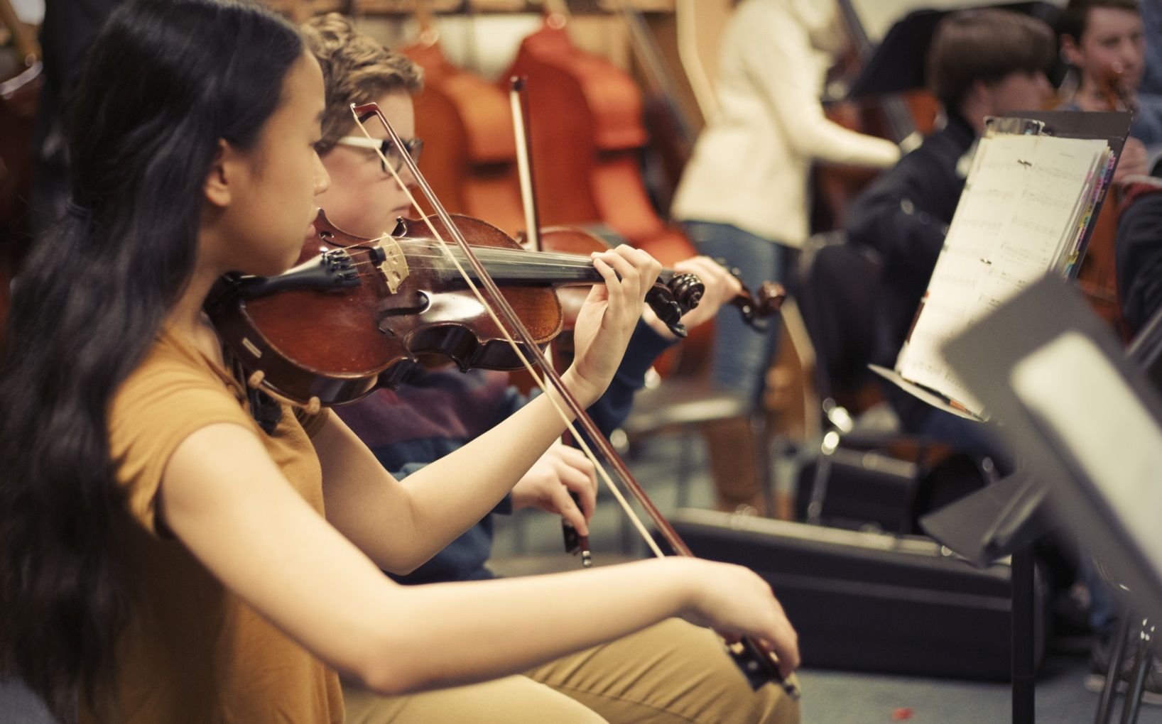 violin players during rehearsal