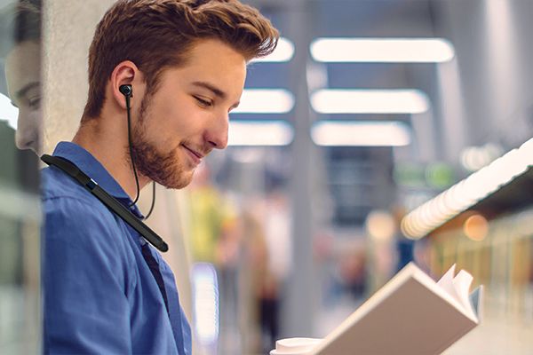 Man listening to music through wireless