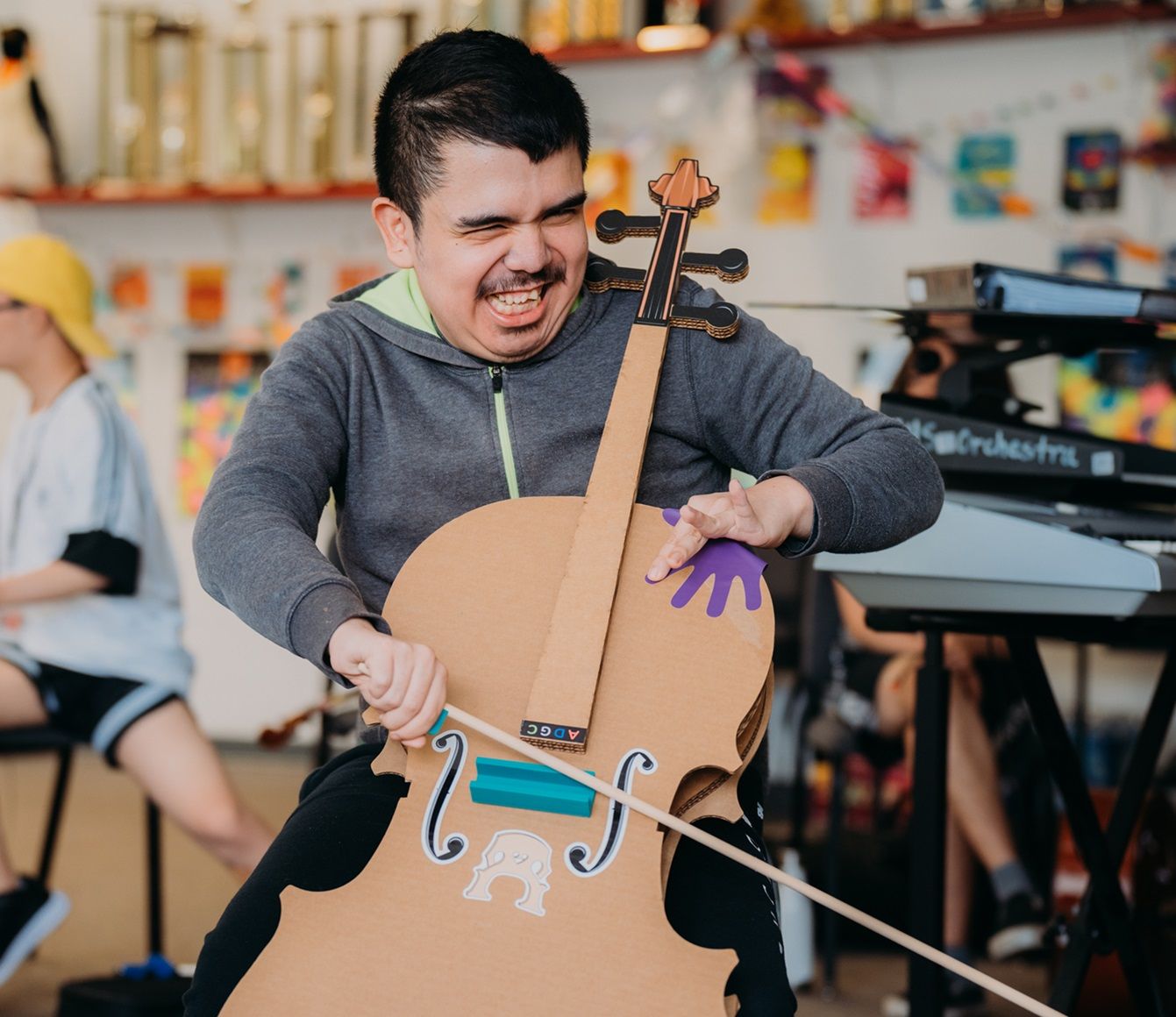 Crescendo Orchestra student playing the cello