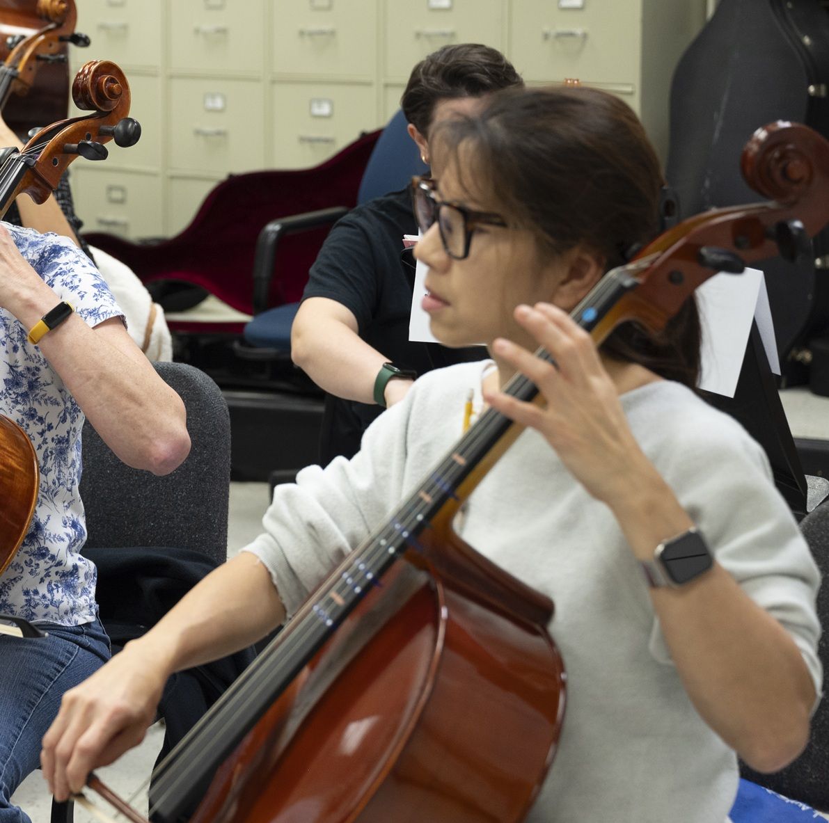 parent playing the cello