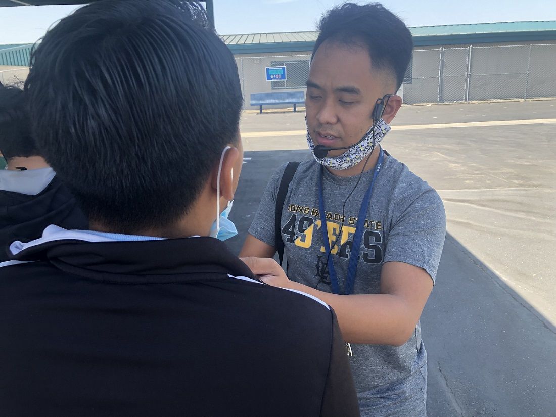 EJ Villanueva with student at Orange Grove Elementary School