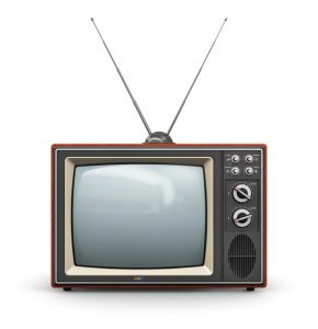 An old-fashioned television set with a "rabbit-ear" antenna on top.
