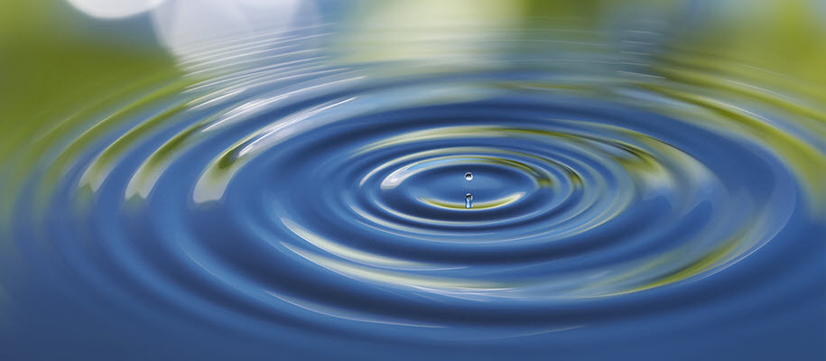 Ripples in water emanating from the center.