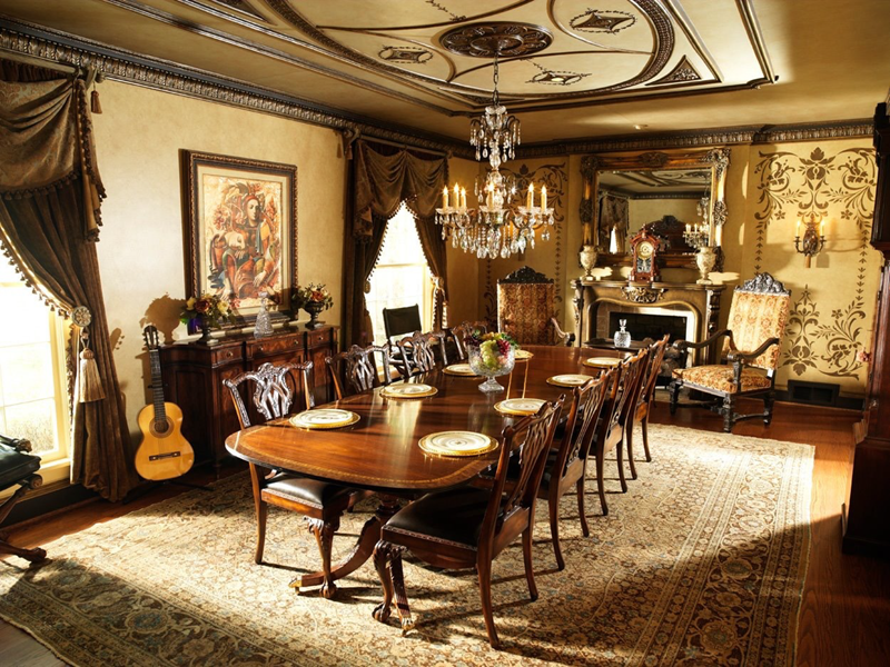 Acoustic guitar leaning against a buffet table in a formal dining room.