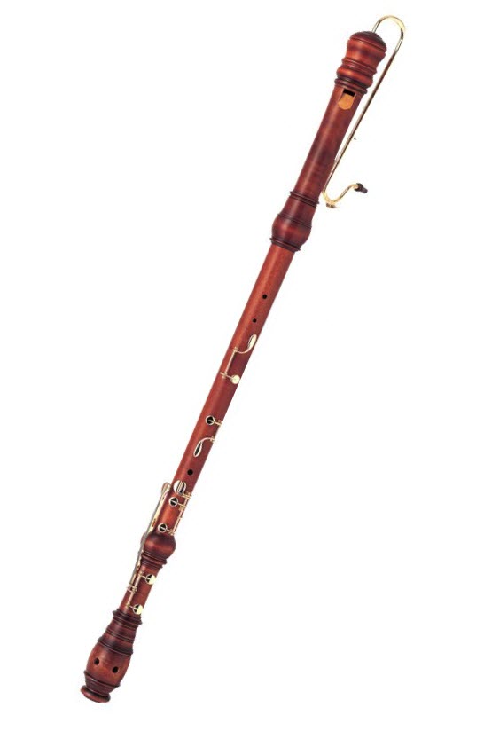 Long wood instrument with brass mouthpiece, keys and accents.