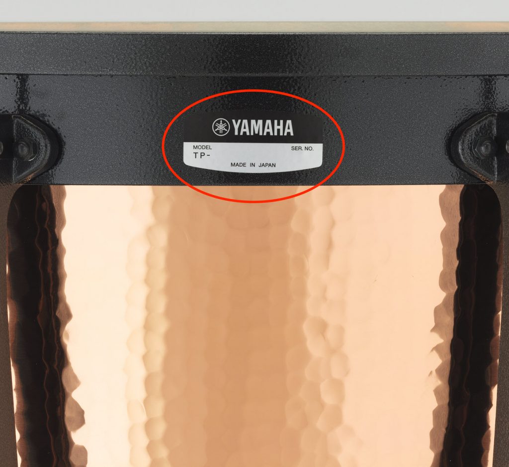Closeup of the Yamaha tag or "badge" attached to the side of the kettle drum or "timpani".