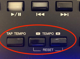 Closeup of control pad on synthesizer with the "tap tempo" and Tempo" buttons circled.