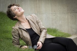 Yamaha Master Educator Emily Threinen sitting in grass