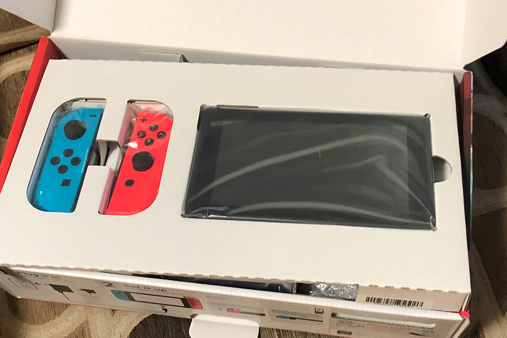 Nintendo Switch console in the box.