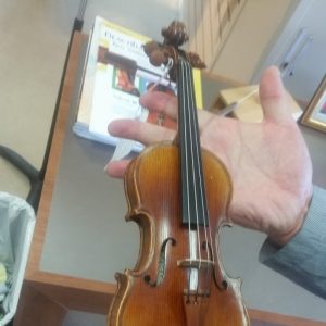 A 1/32 size violin.