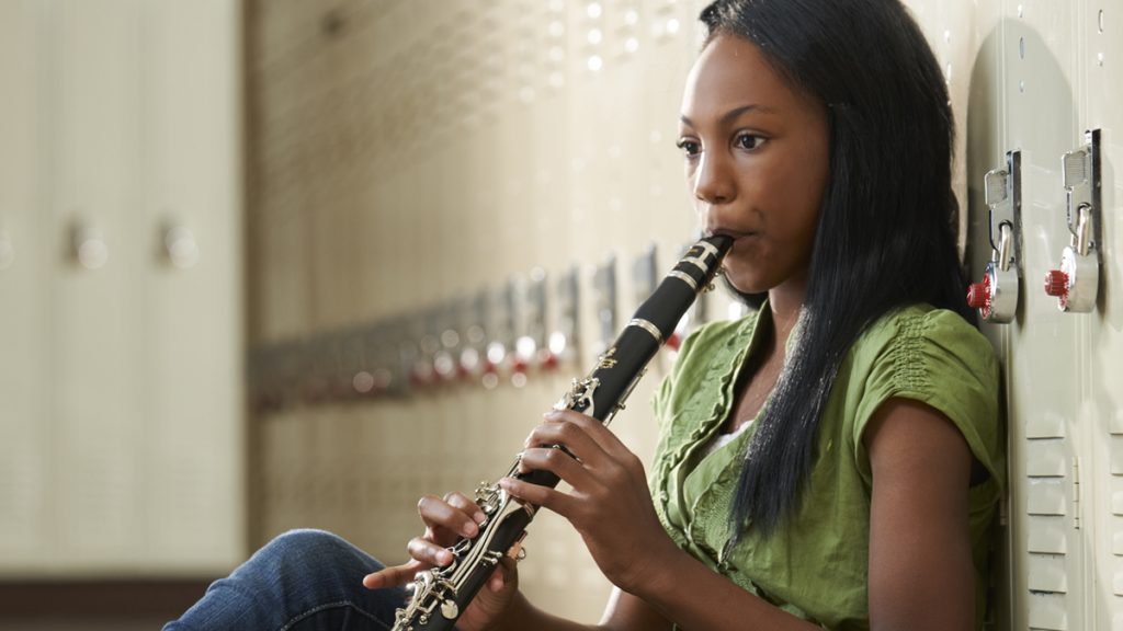 female student playing clarinet