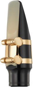Close-up image of the saxophone mouthpiece, ligature and reed.