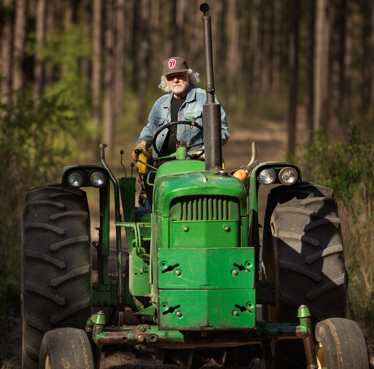 Chuck Leavell on a tractor.