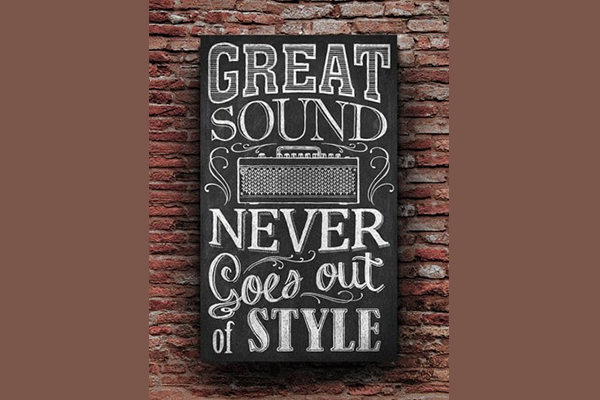 Typographic hand-written poster with the words, "Great sound never goes out of style" and an illustration of a Yamaha desktop amp