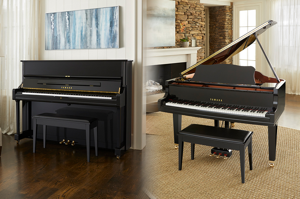 An upright and a grand piano in living room setting, side-by-side.